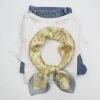 The 70*70 light-colored flower-patterned thin silk scarf for spring and summer is a high-end silk scarf that is a bestseller both in foreign trade and domestic sales details Picture
